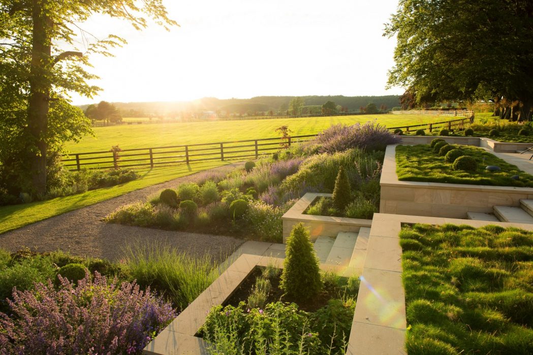 grasses terraces flowing colourful welch landscape design